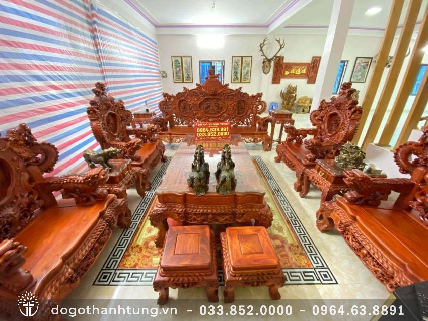 Bộ Bàn Ghế phòng khách Rồng Khuỳnh Nghê Đỉnh gỗ Hương Đỏ Lào 12 món hàng đại - Bộ sản phẩm yêu thích của rất nhiều đại gia hiện nay bởi thể hiện rõ được uy quyền và đẳng cấp của gia chủ.