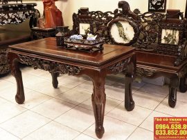 Dáng bàn thanh thoát, mặt bàn trơn nguyên tấm gỗ gụ. Chân bàn đục chạm vô cùng tinh tế hình ảnh ngà voi cách điệu