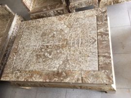 Mặt bàn trơn sử udnjg tấm gỗ nu nghiến nguyên khối trông như mặt đá