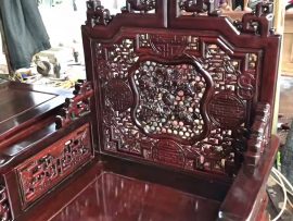 Ghế đơn trong bộ trường kỷ Huế đục tích Lân vờn cầu