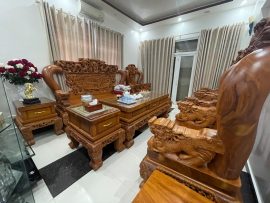 Bộ bàn ghế Minh Quốc rồng chầu nguyên khối gỗ gõ đỏ vip