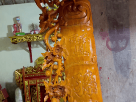 Cuốn thư bằng gỗ gõ đỏ